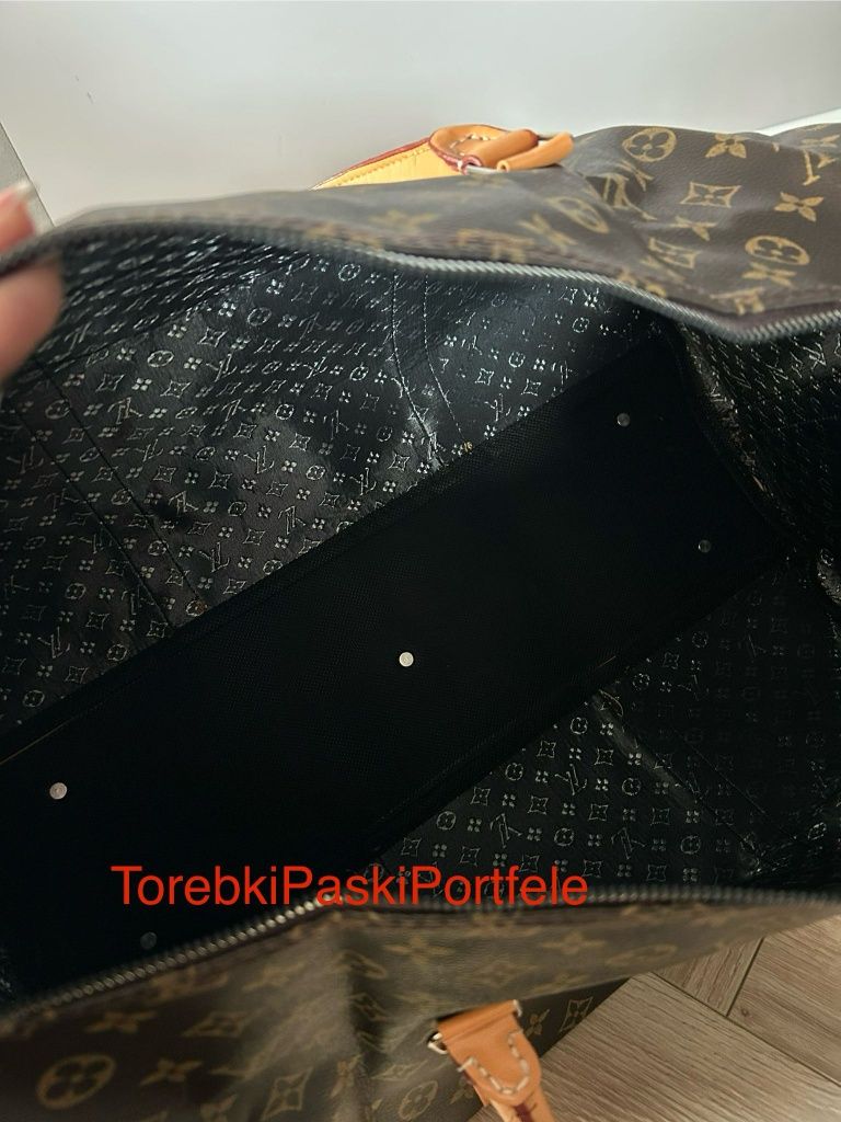 Nowa torba podróżna Louis Vuitton.