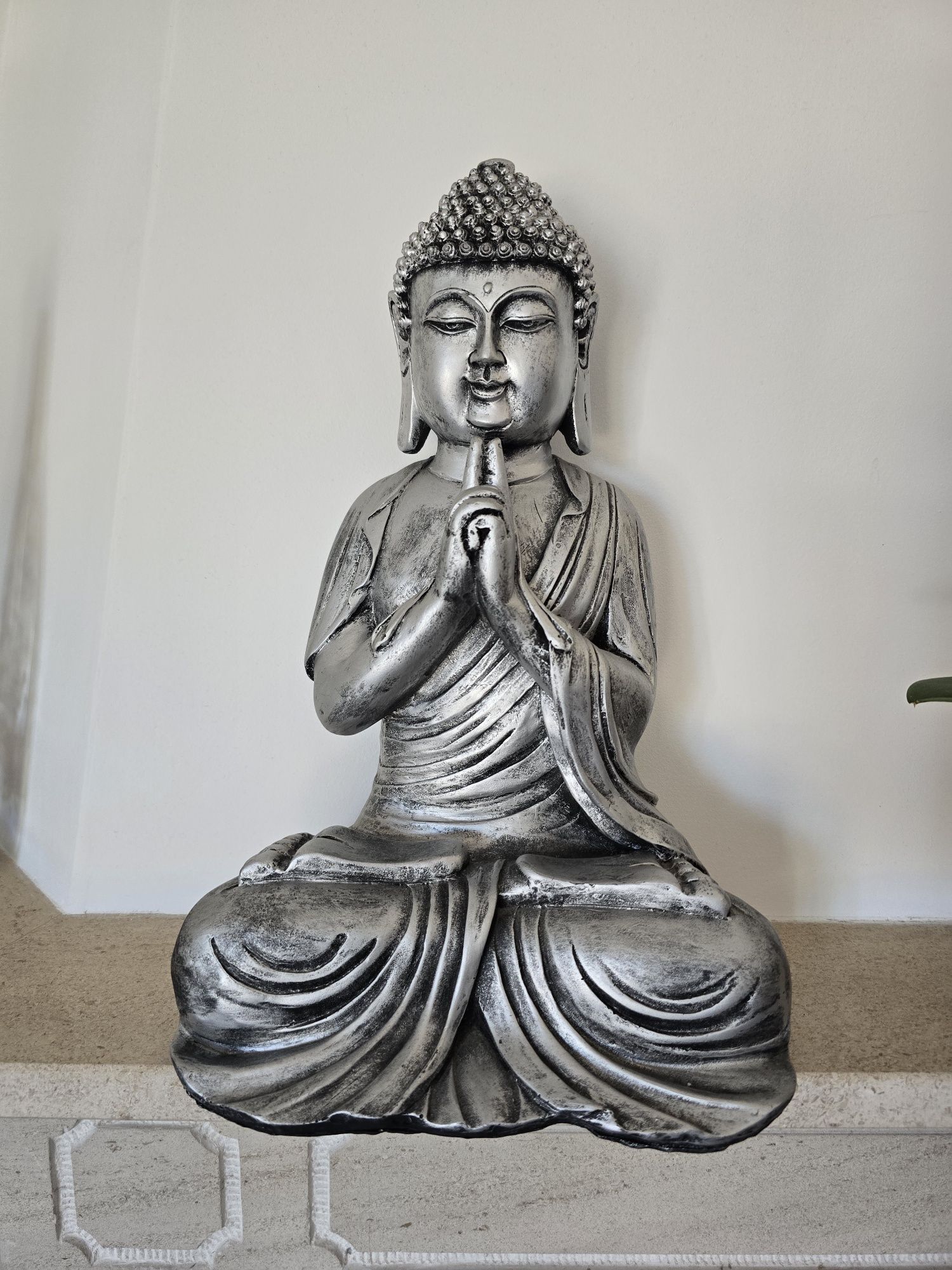 Buda prateado em Marfinite