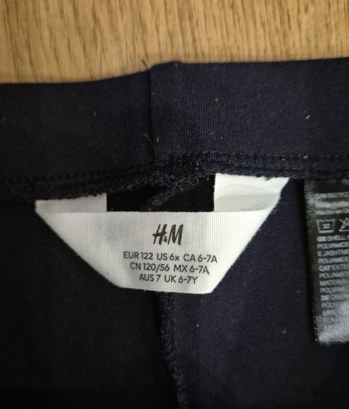 H&M 12 128 legginsy dzwony spodnie rozszerzane typu flare granatowe