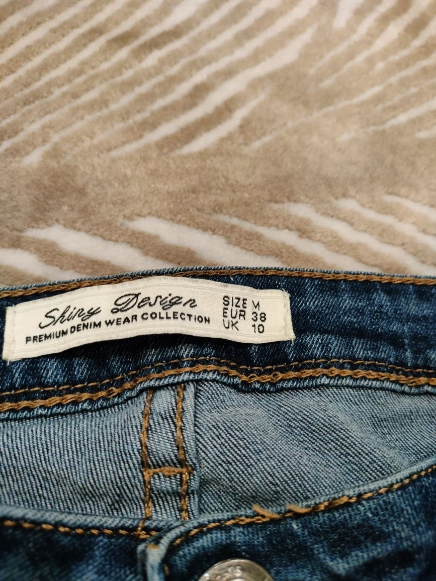 Damskie spodnie jeans rozm 38 M