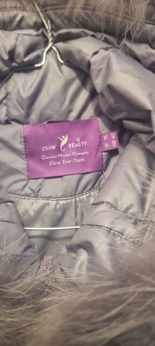 Жіночий пуховик з натуральним хутром