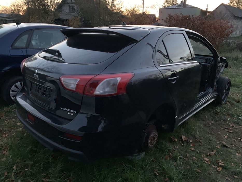 Lancer sb/sedan X evo ralliart czesci karoseria drzwi zderzak