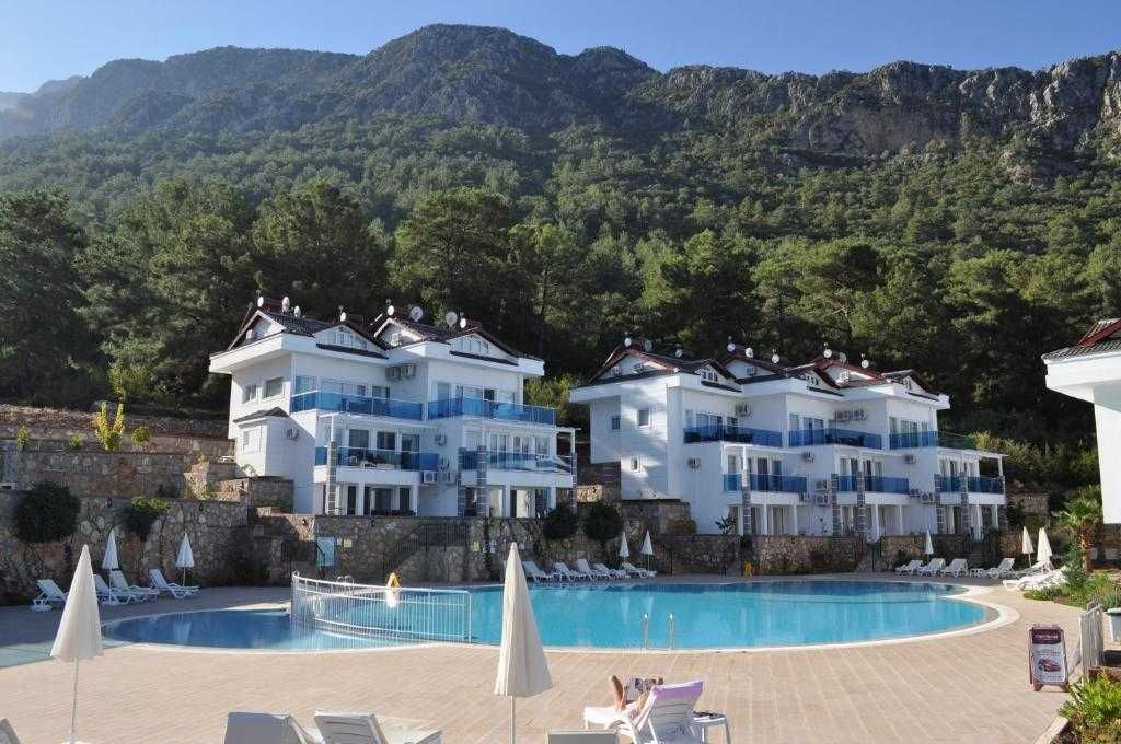 Аренда апартаментов 2+1, 90 м.кв. Личный сад с барбекю.Олюдениз,Турция