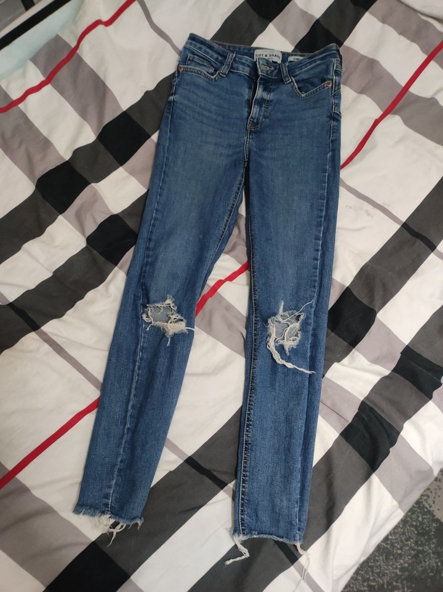 Spodnie jeansy damskie rurki skinny z dziurami New Look S 36