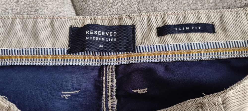 Spodnie męskie Reserved rozm. 34