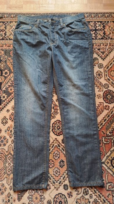 Spodnie męskie jeans rozmiar 33 bawełna aplikacja na nogawce wąż