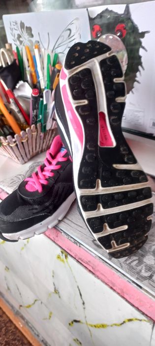 Женские кроссовки фирмы "NIKE Reax Run 9 "