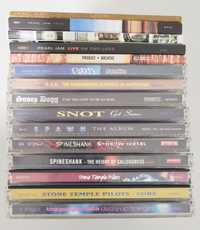 CDs de música de diversos grupos