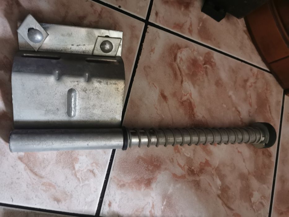 Odbojniki sprężynowe do bramy garażowej