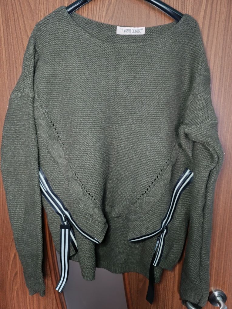 Sweter z ozdobnymi zamkami