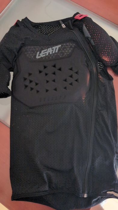 Proteção de bike, capacete, colete etc