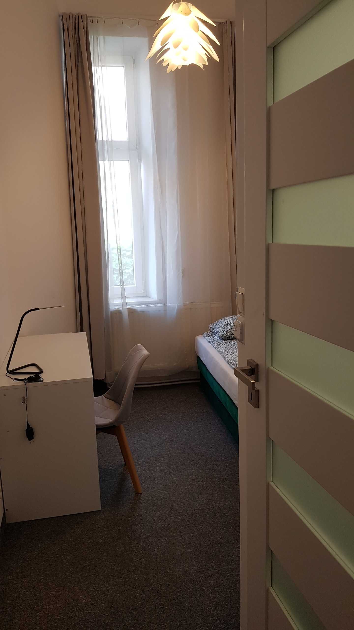 Pokoje z prywatnymi łazienkami w ścisłym centrum