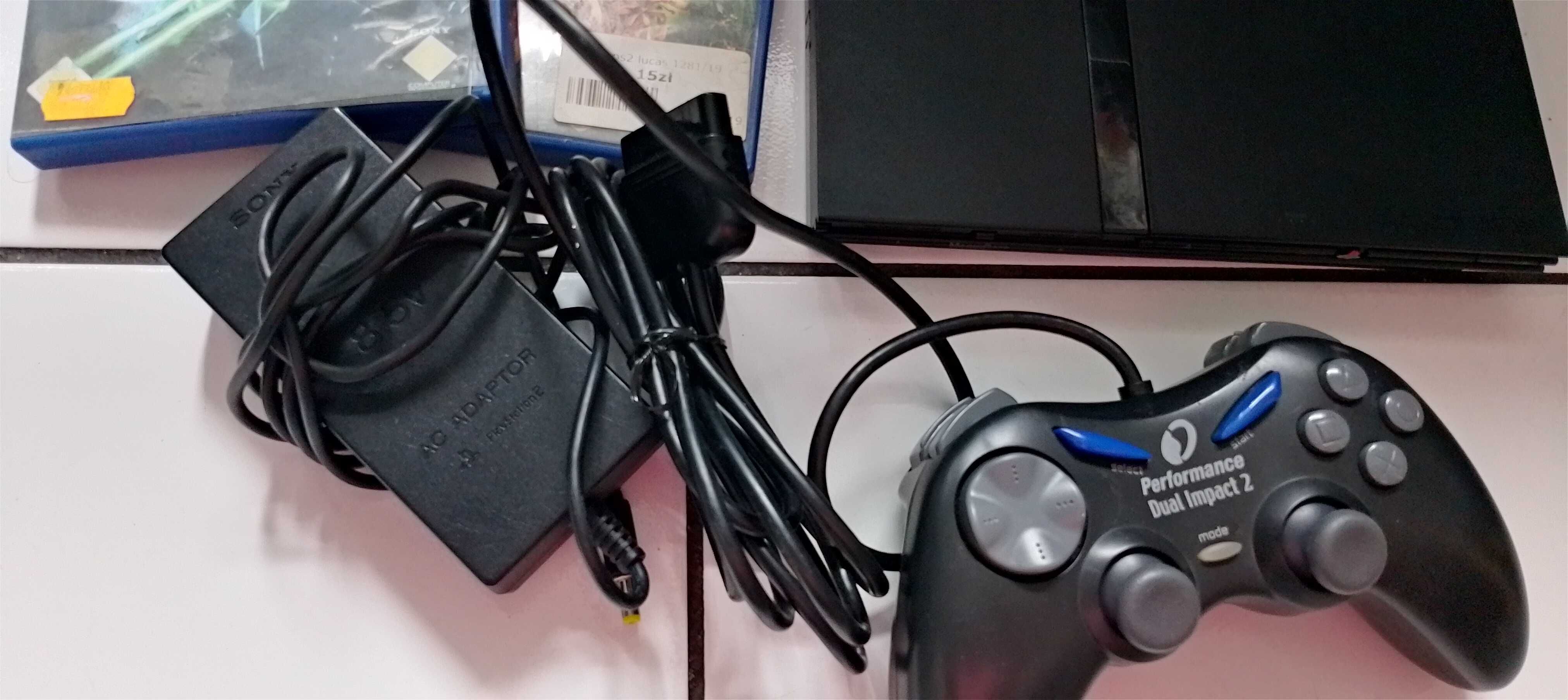 Konsola bdb stan PlayStation 2 komplet z grami i padem