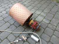 Silnik elektryczny starej wirówki Bauknecht z bębnem