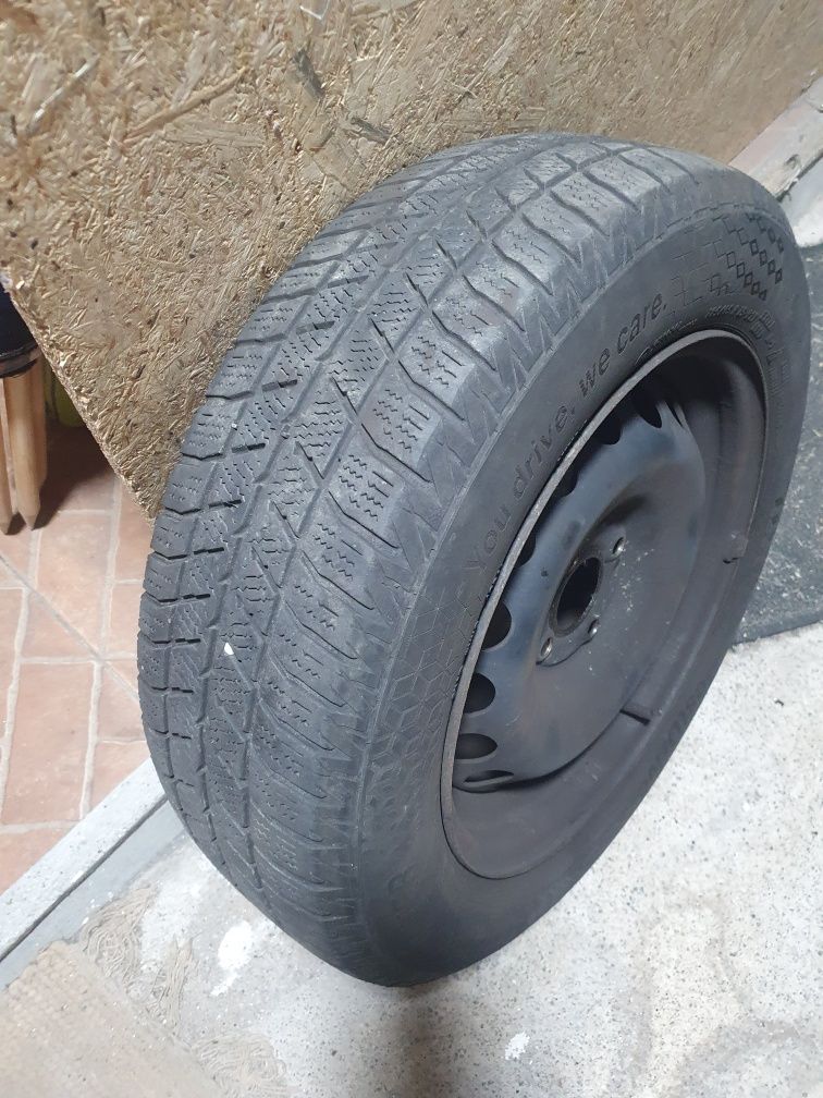4 pneus  neve  com jantes de ferro com bom piso.