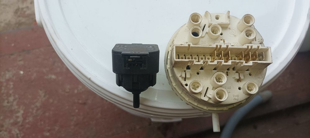 Electrolux Zanussi Aeg тен, замок люка, пресостат реле рівня води, тер