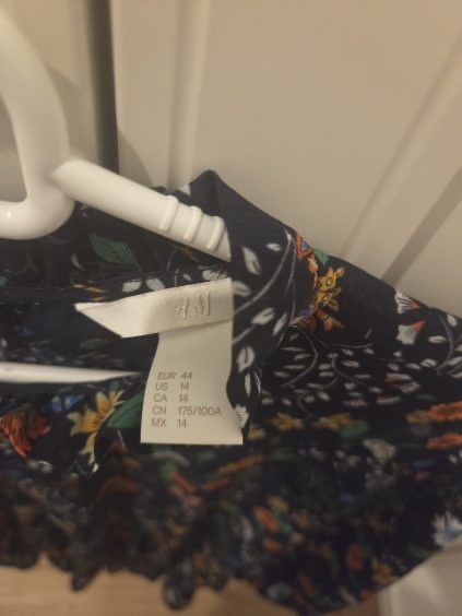 Elegancka bluzka w kwiaty hm 44 zwiewna