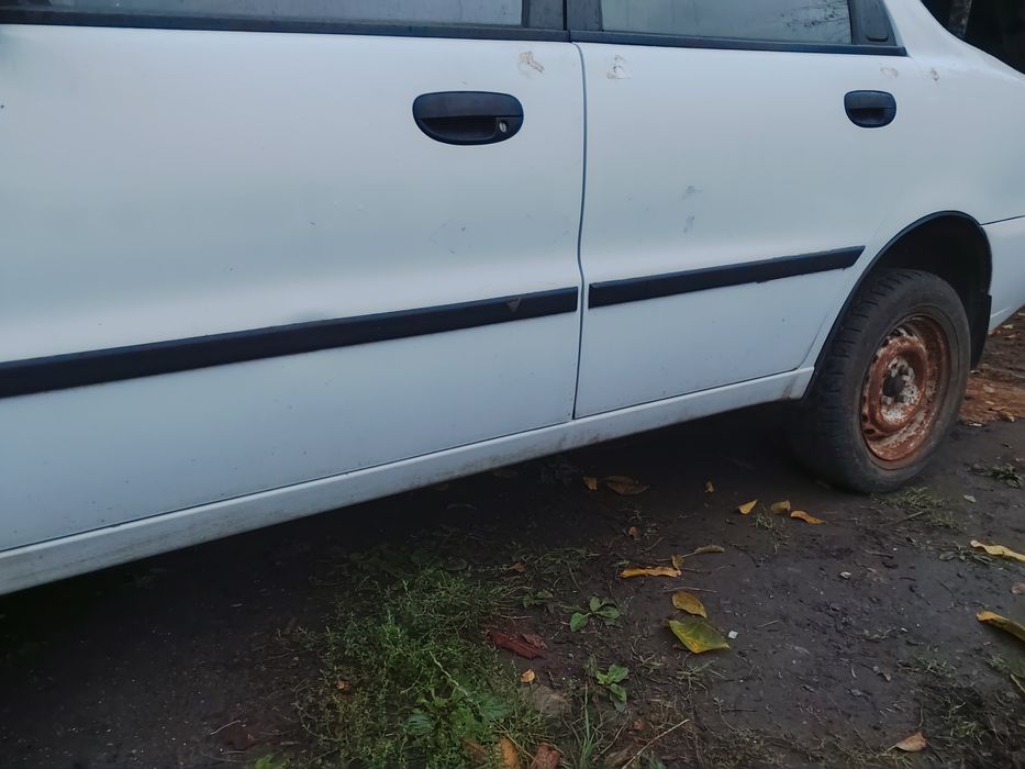 Дверь передняя задняя део Ланос сенс