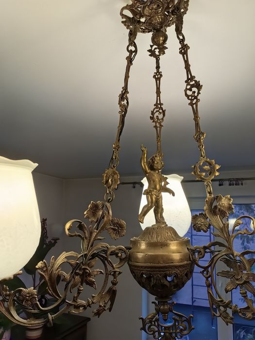 Żyrandol mosiężny anioły antyk rzezbiony