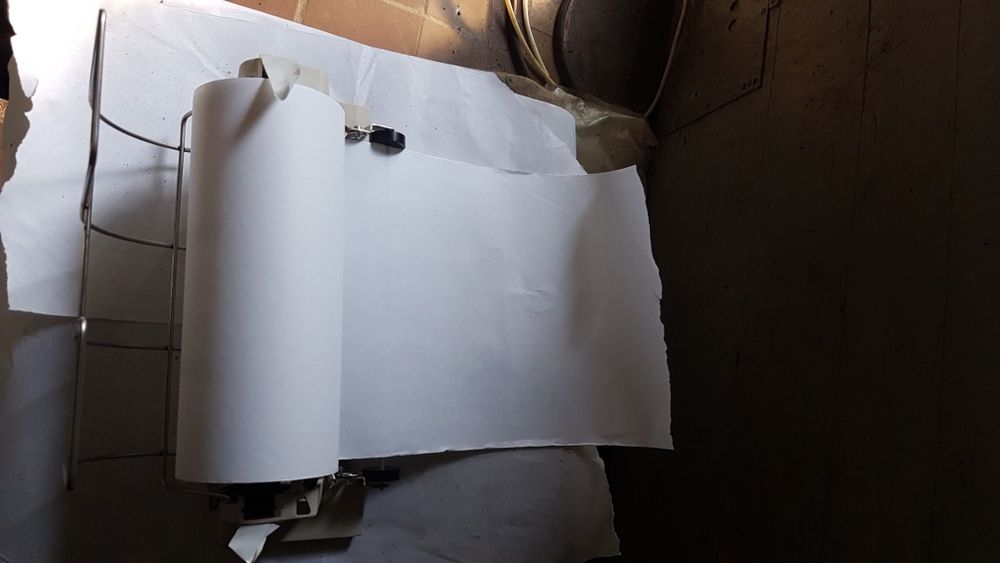 Пристрій подачі рулонного паперу в принтер