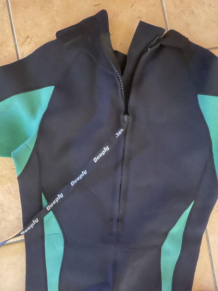 Fato de mergulho/surf