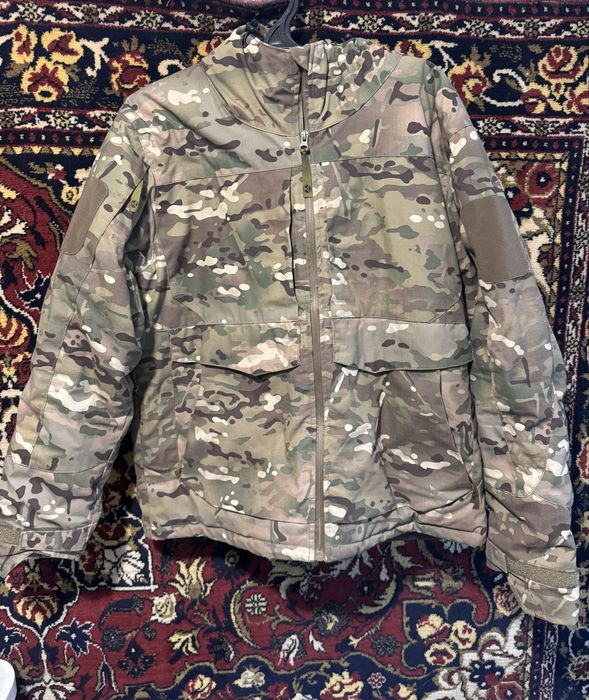 Продам зимову куртку в кольорі мультикам