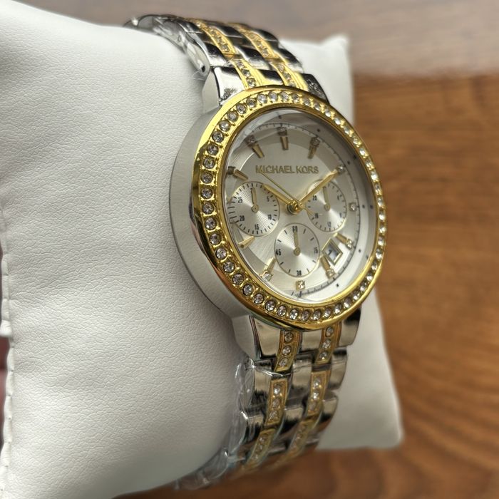 Жіночий годинник Michael Kors на браслеті комбінованого кольору