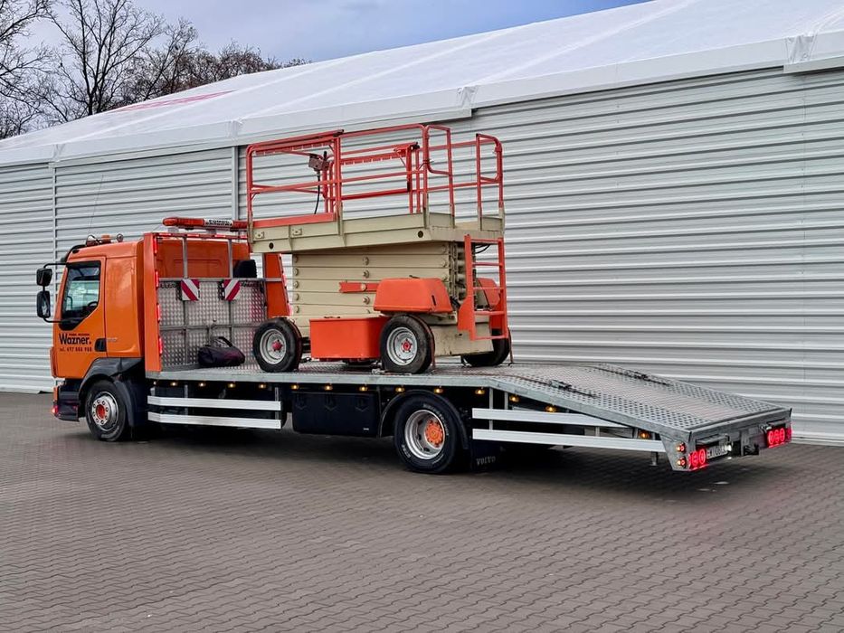 Transport maszyn, ciągników, przyczep, samochodów, laweta