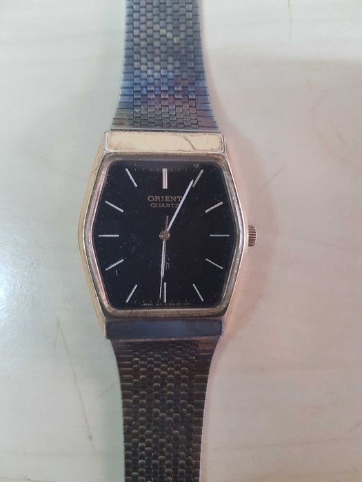 Zegarek nareczny ORIENT Quartz GP sprawny kolor zloty i czarny