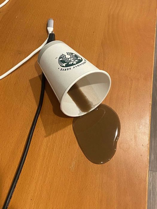 Starbucks prop: 12-ounce coffee cup with simulated spillage effect
