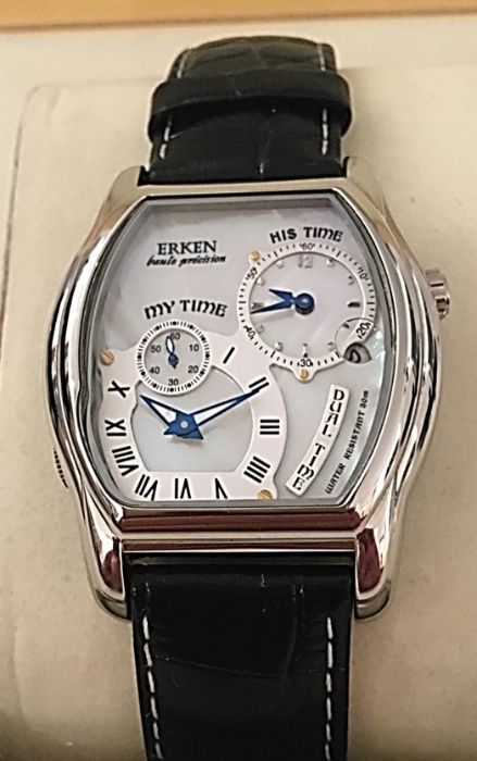 Erken relógio multifunções em aço polido