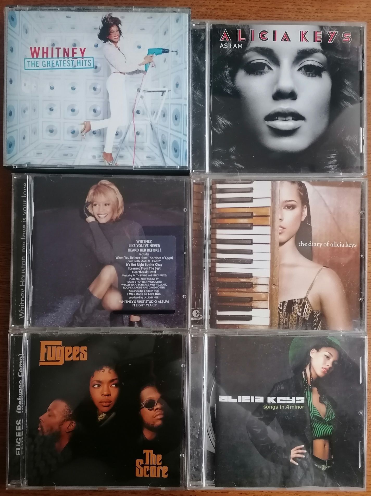 Cd's Whitney Houston, Alicia Keys e Fugges