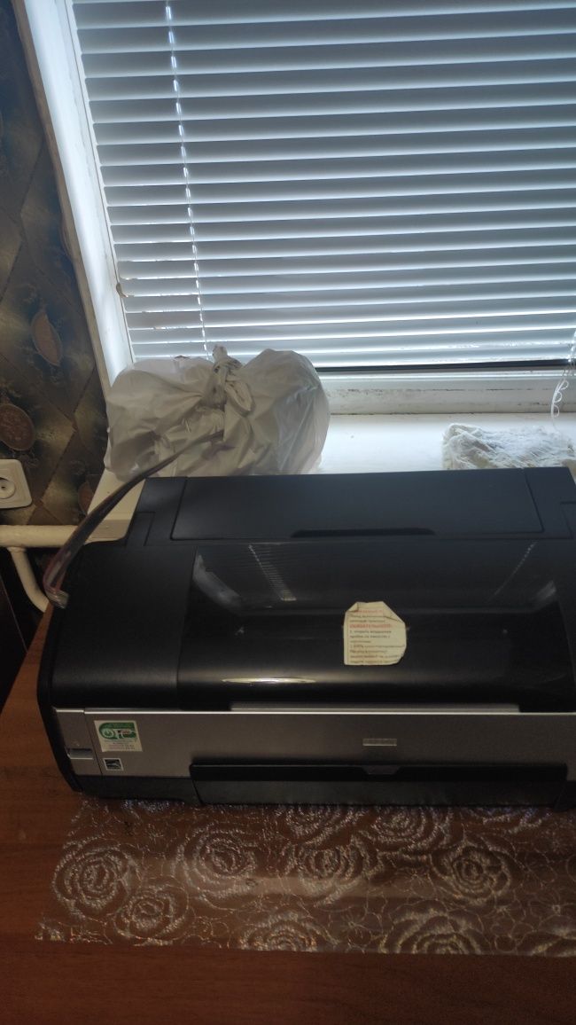 Epson Stylus Photo 1410 Требует сервисного обслуживания