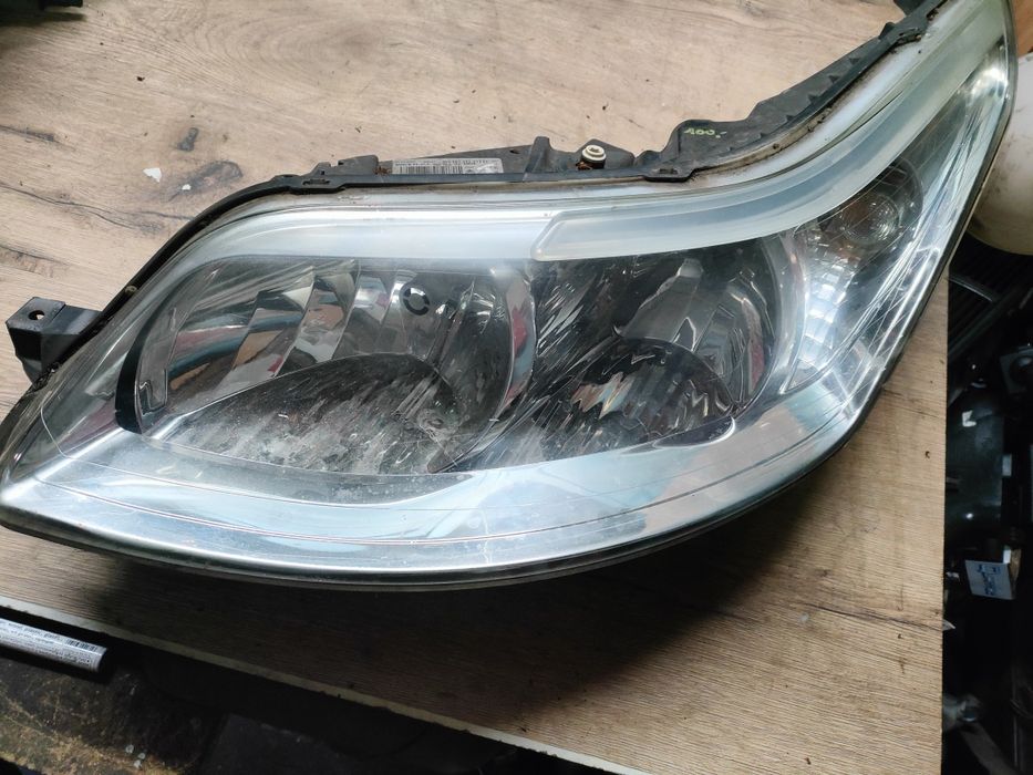 Citroen C4 reflektor lampa lewy przód