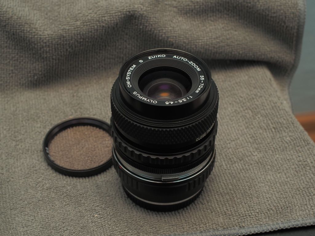 Obiektyw Oly om-system S zuiko auto-zoom 38-70 1:3,5-4,5 + K&F OM-M4/3