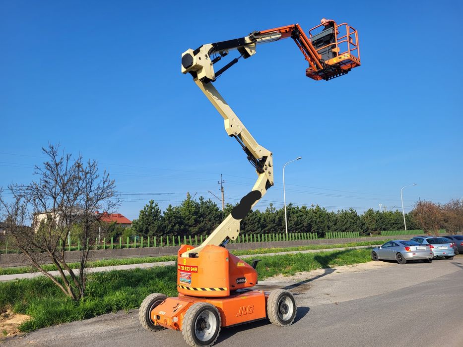 Podnośnik zwyżka łamana przegubową JLG E450AJ  .