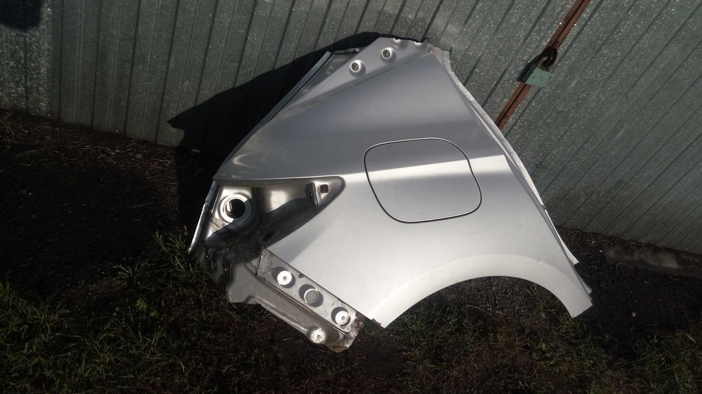 Opel Astra K V Błotnik tył tylny srebrny Z176 HB 5-drzwi