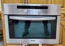 Продам духовой шкаф Miele H 4010 BM с функцией микроволновки.