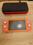 Nintendo Switch Lite różowy w pełni sprawny plus case i ładowarka