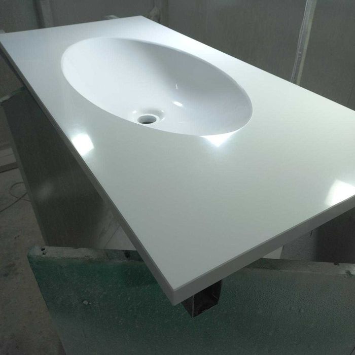 Умивальники цільновилиті з стільницею