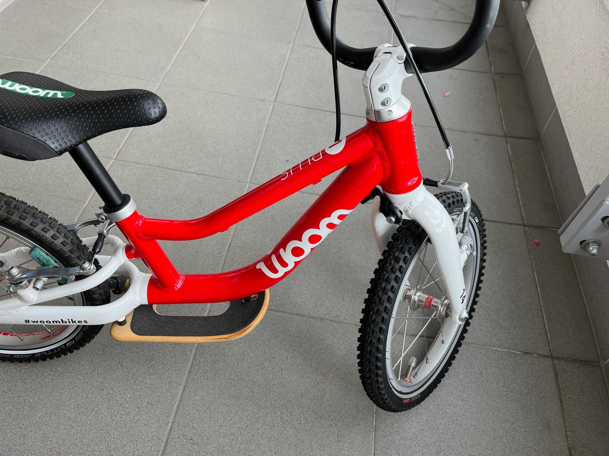 Woom 1 plus czerwony rowerek biegowy podpórka nóżka