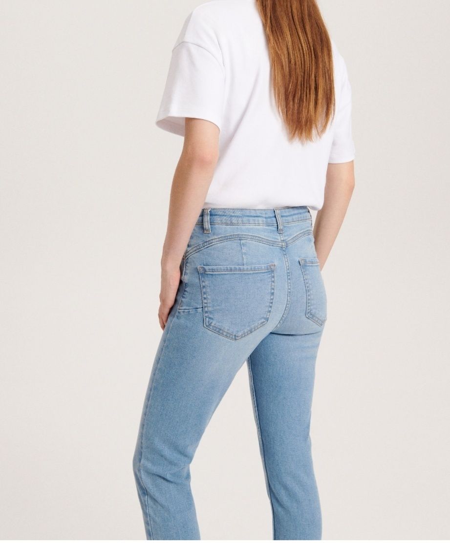 Nowe jeansy push up Reserved 44 XL kolor niebieski bez metki