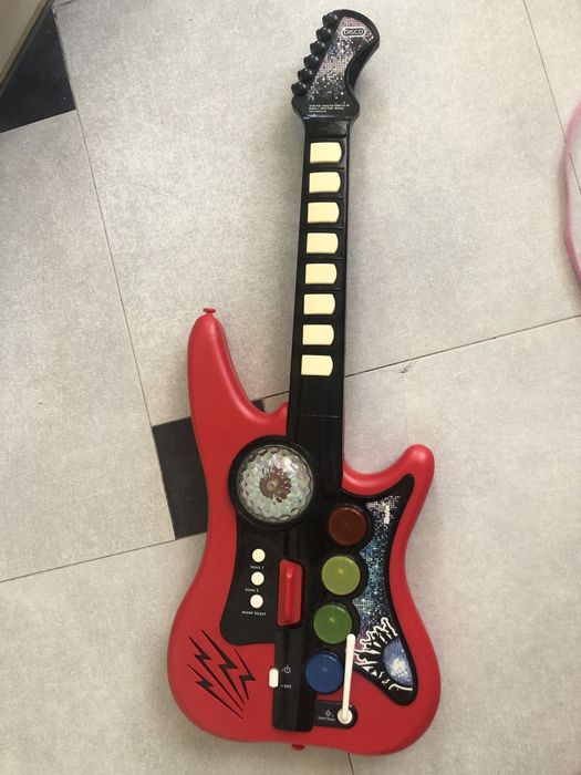 Рок гітара, інтерактивна іграшка. Все працює, музика, світло, струни