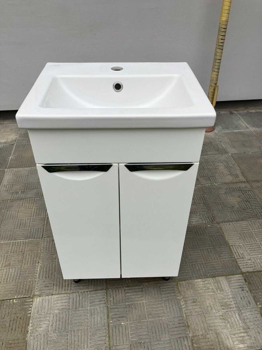 Умивальник у ванну