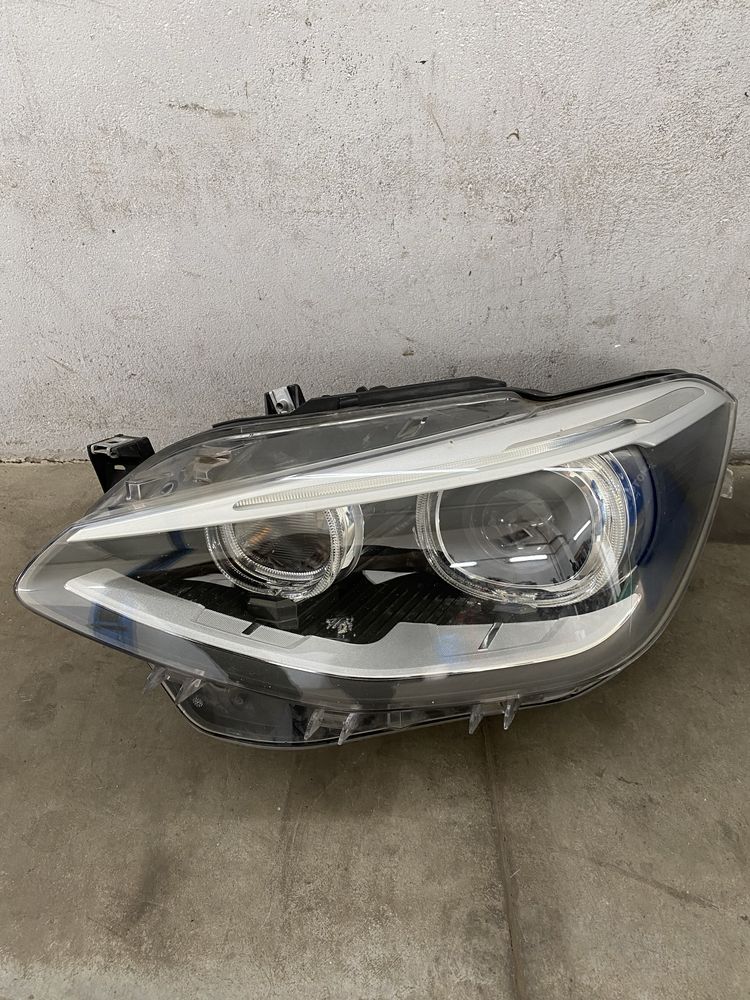 Lampa lewa BMW F20 F21 Bi-Xenon Skretny