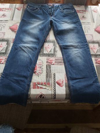 Spodnie jeansy nowe