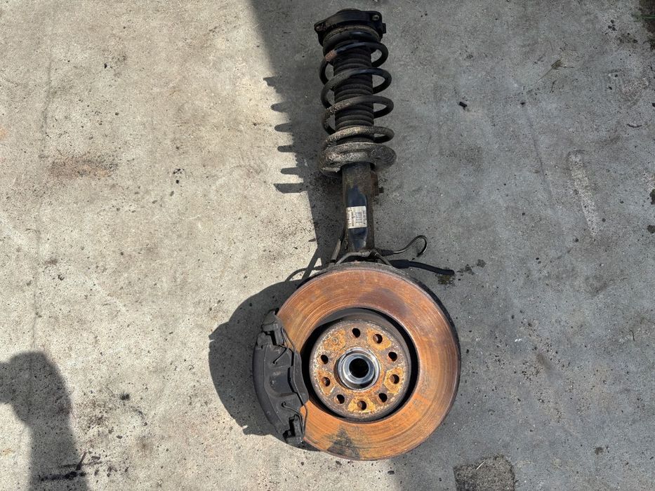 VW PASSAT B7 2.0 TDI AMORTYZATOR PIASTA ZWROTNICA SACHS MCPERSON LEWY