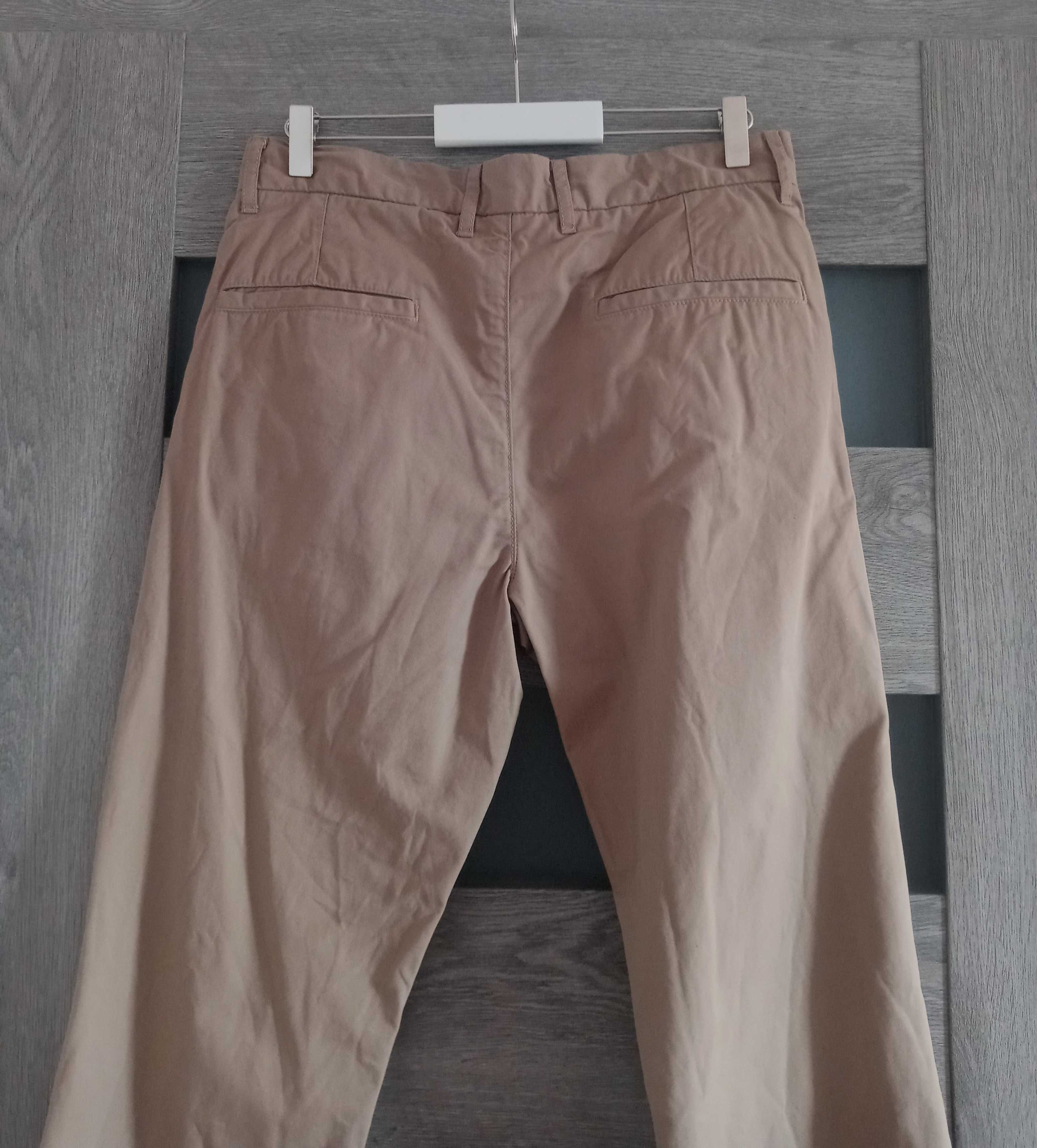 H&M L.O.G.G. beżowe spodnie chinosy camel slim fit 32