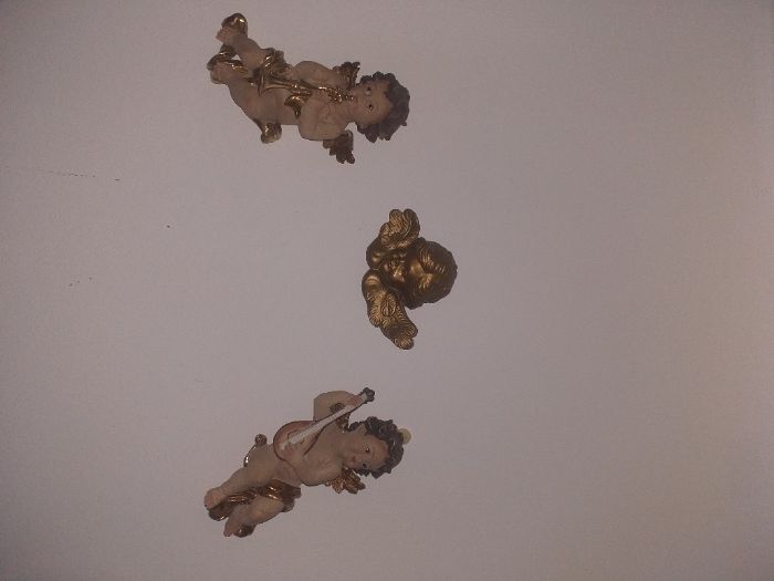 Anjinhos em porcelana antigos e sem defeito.
