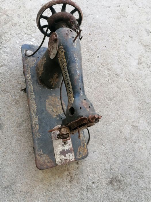 Máquina de costura singer